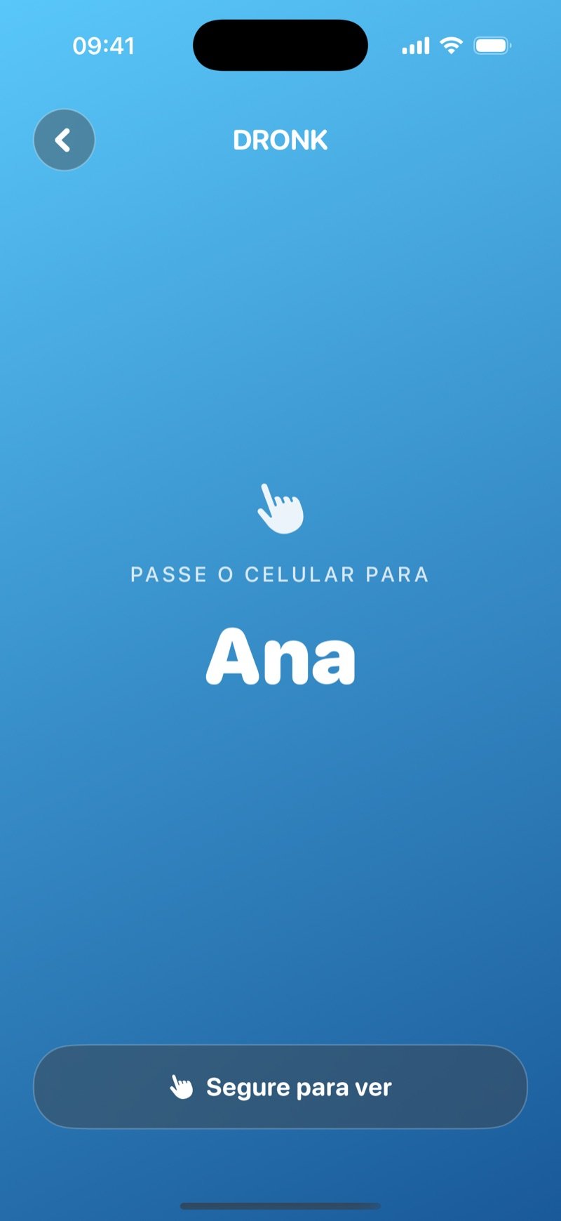 Tela de passar o celular no Espião, em um degradê azul: Pass the phone to Olivia, com um botão Hold to reveal e a carta ainda escondida (captura da versão em inglês)